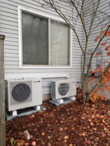 Mitsubishi-Ductless-and-Sanden-Heat-Pump-Water-Heater-ground-mounted-2-1025