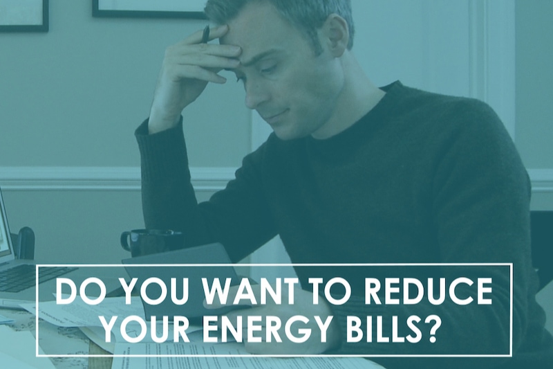 Video - Do You Want to Reduce Your Energy Bills? Stressed out man doing bills with the text, 